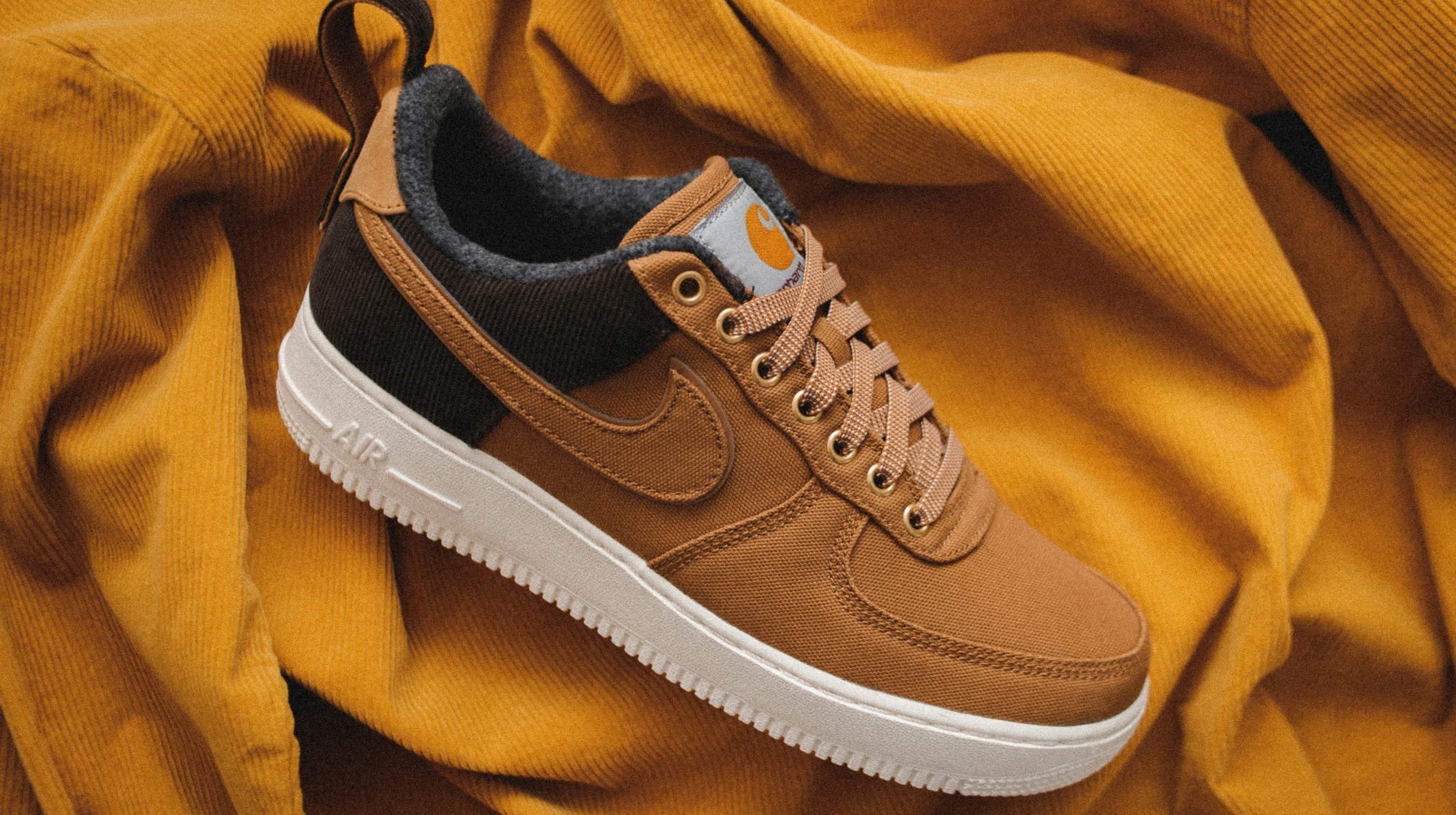 Nike trainer sitting on a corduroy shirt