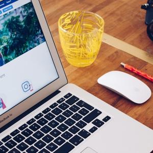 Laptop showing Facebook ads