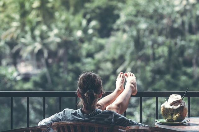 Starting Over Woman Relaxing on Balcony