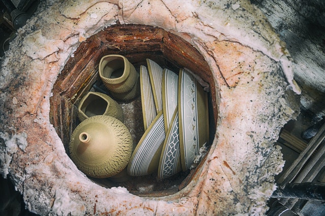 Ceramic kiln full of bowls ready for firing