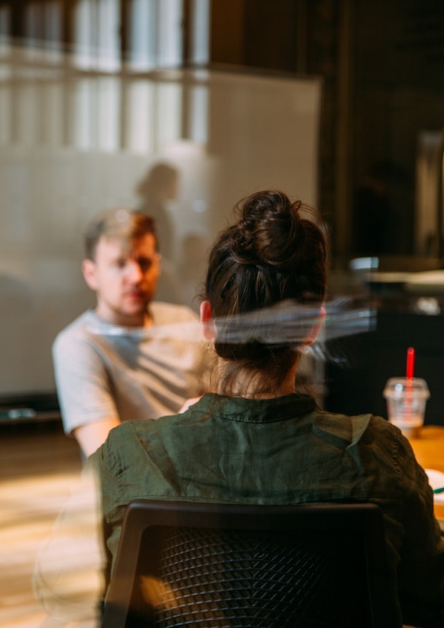 Coworking Two People Talking]