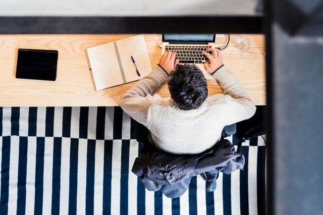 Overhead View of Seated Person Using a Computer