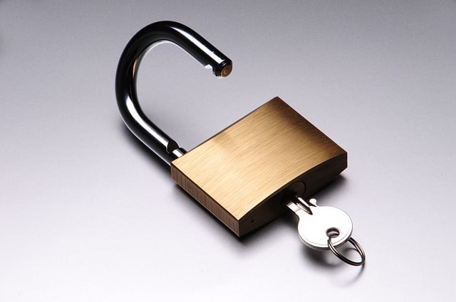 Padlock Lying Open on a Desk