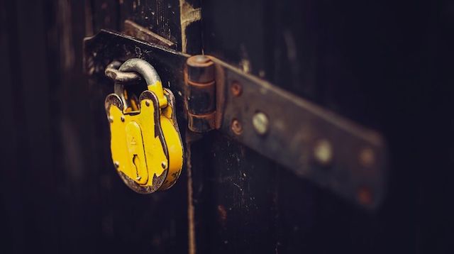 PHP Web Development Yellow Padlock on Old Latch