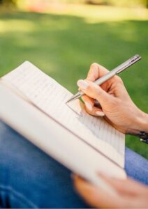 Repeat Customer Woman Writing with a Pen