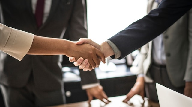 Sources of Business Finance Two People Shaking Hands