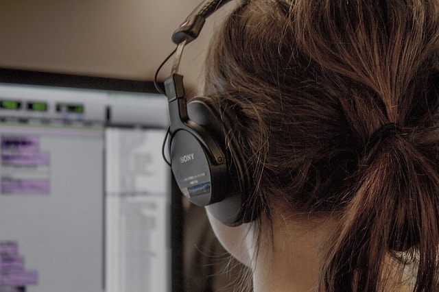 WordPress Developer Female Developer with Headphones