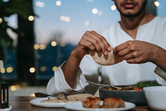 Man dining in an outdoor setting