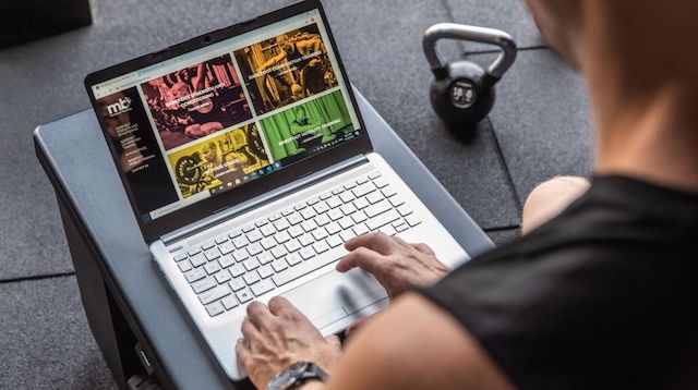 Marcus Bradbery MB Barefoot Training on his computer