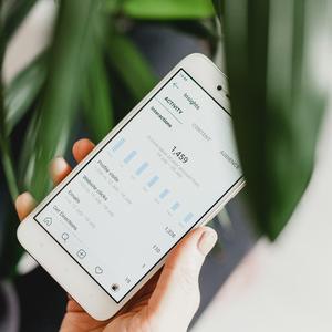 Phone showing metrics for Instagram
