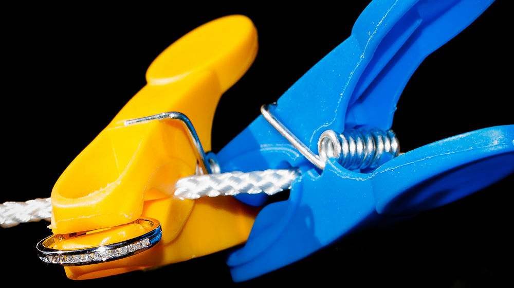 Yellow and blue clothespins representing blog and store