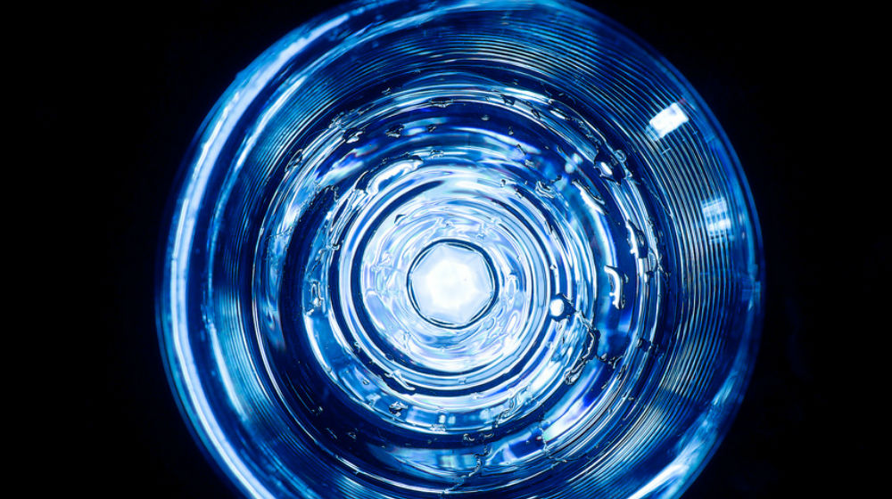 looking down into glass of water