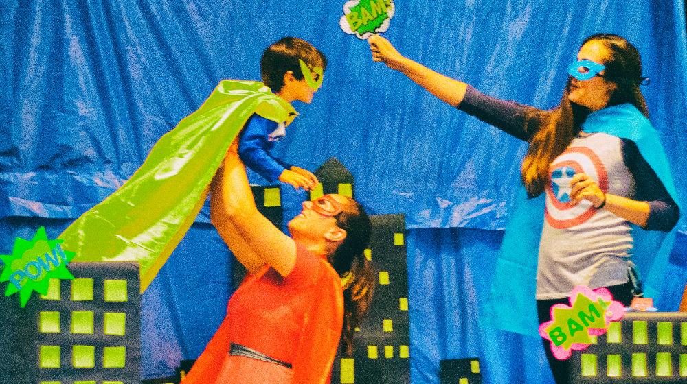 people dressed up as superheroes