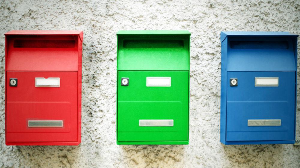 three colorful mailboxes