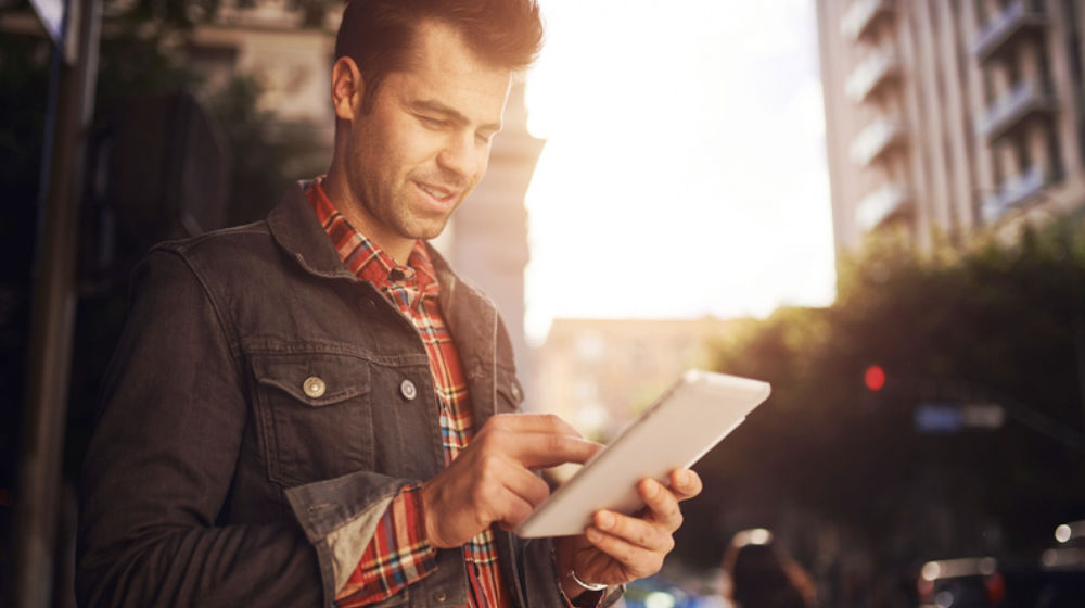 man on laptop in LA to illustrate social media trends