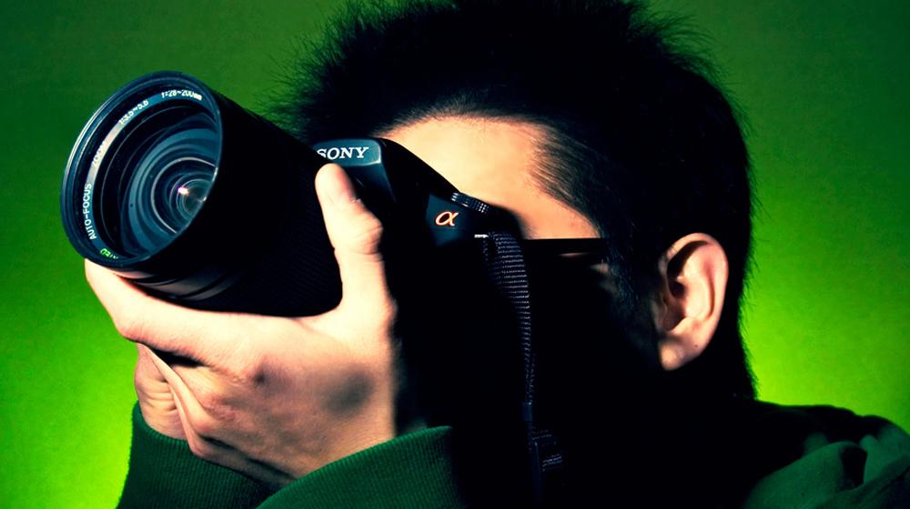 Close-up of photographer to represent image sharing via Flickr