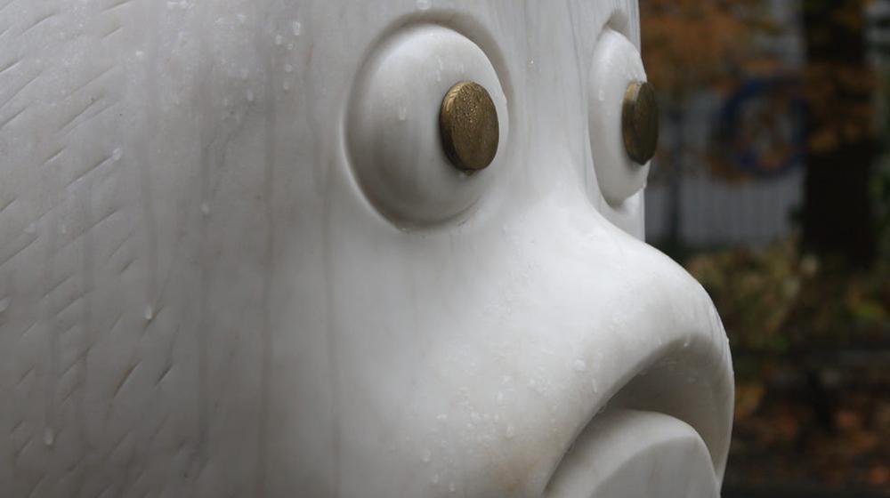 close-up of cartoonish ghost head statue to represent scary blogging blunders