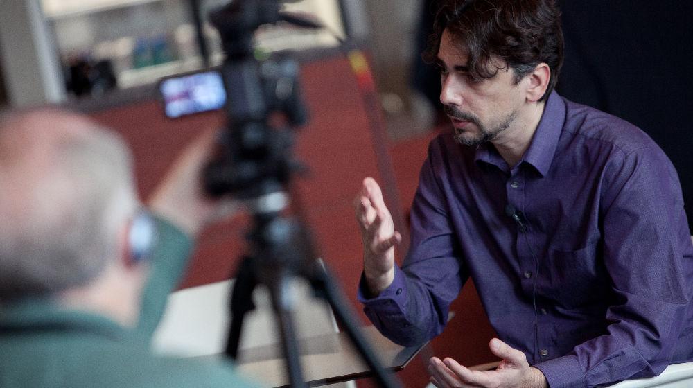 man talking on video