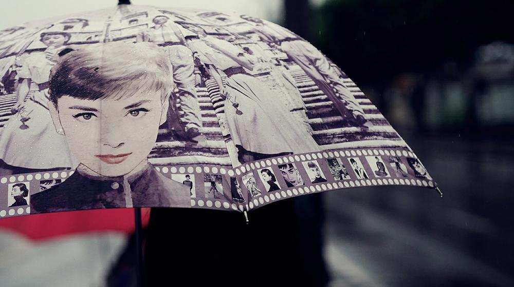 audrey hepburn umbrella to represent building a brand