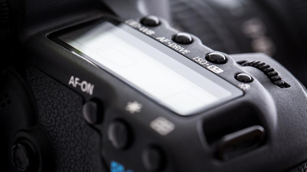Closeup of digital camera to represent stock images
