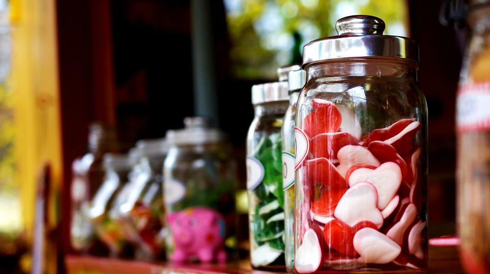 heart shaped candy in jar to represent how to sell with emotion