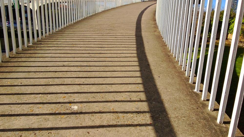 straight line shadows on sidewalk to represent straight lines when writing clean code