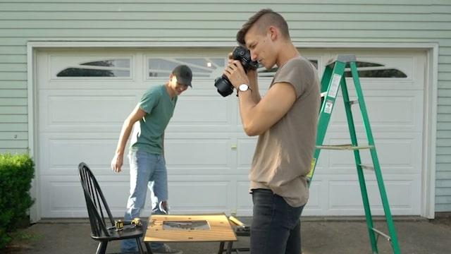 Man Taking Photo of Product Outside of Home