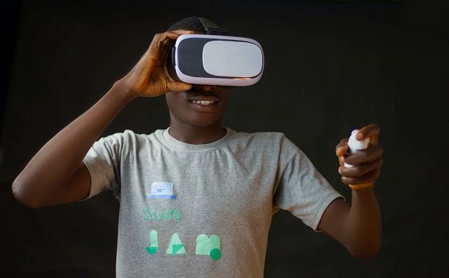 Man Using VR Headset And Remote