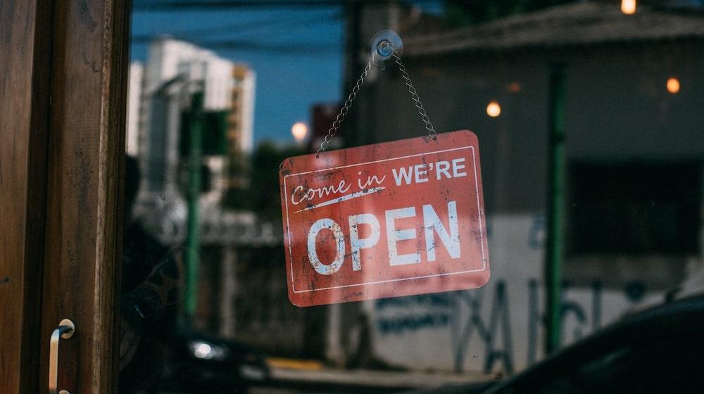 Red Open Sign on Door Window