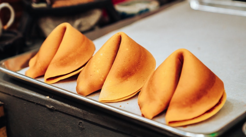 Fortune cookies on baking tray
