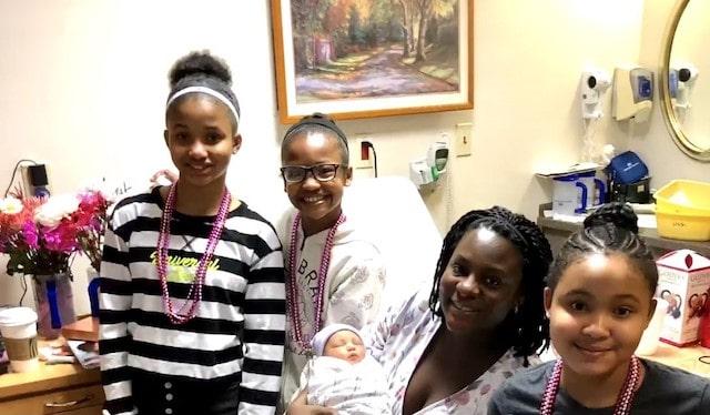 Erin King-Mullins and her children at the hospital