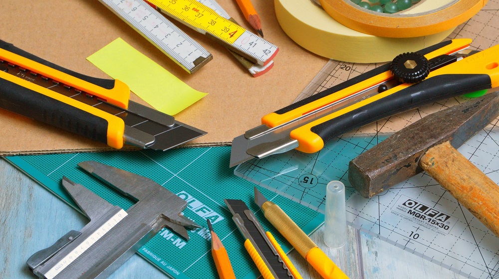 Pile of tools resting on work surface