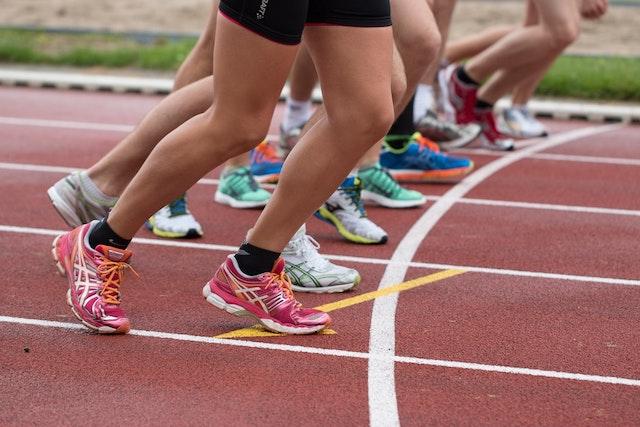 Runners at starting line on a track