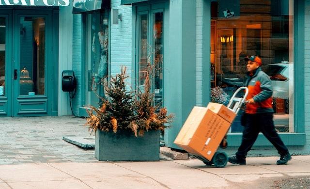 Delivery man delivering boxes