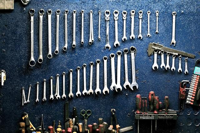 Assorted tools resting on workbench