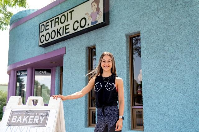 Lauren in front of her bakery and storefront