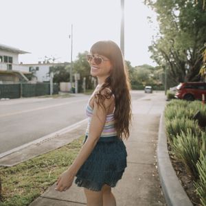 Natasha Williams walking on sidewalk