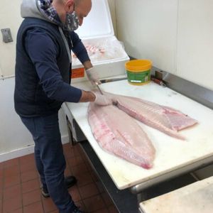 Robert cutting fish