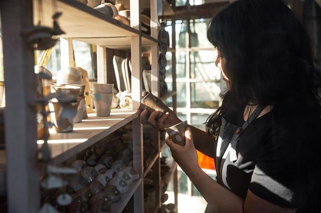 Knotwork LA owner Linda Hsiao looking over her products