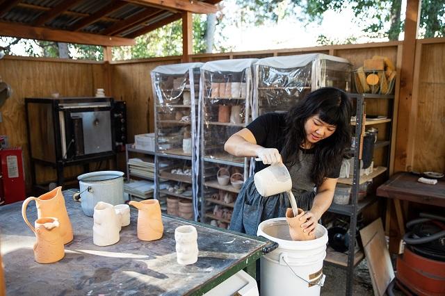 Linda Hsiao working in her studio