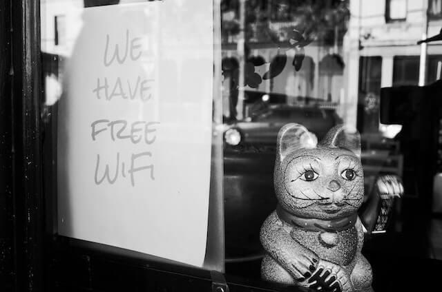 Free Wi-Fi sign with cat statue