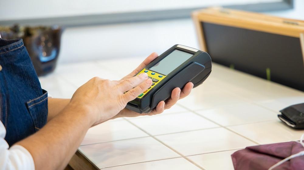 Employee using a point of sale system