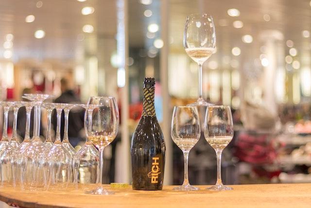 Wine pobble with wine glasses at shopping event