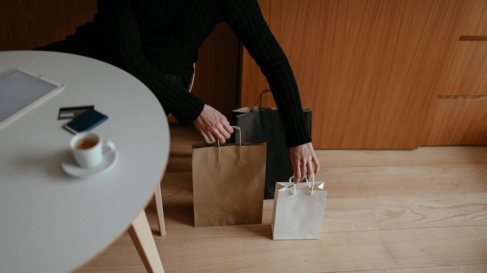Person with shopping bags and credit cards