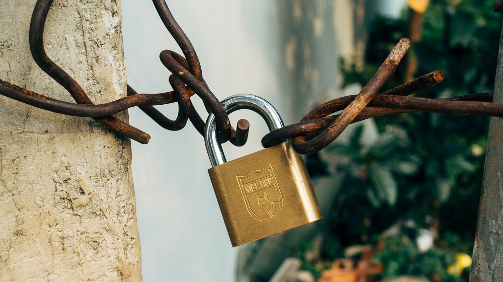 Padlock holding wires together