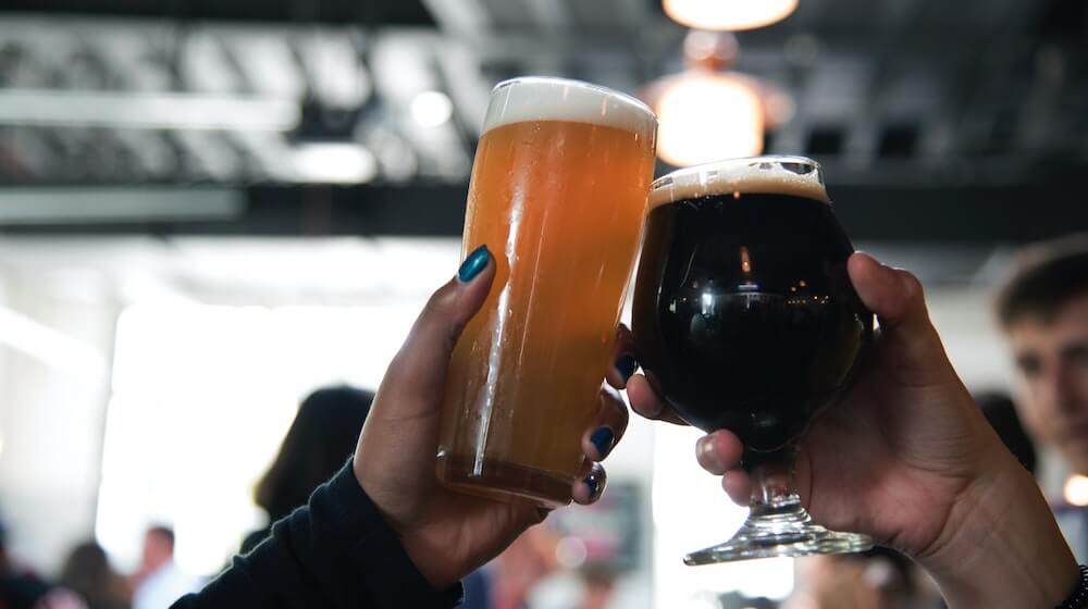 cheers with two beers
