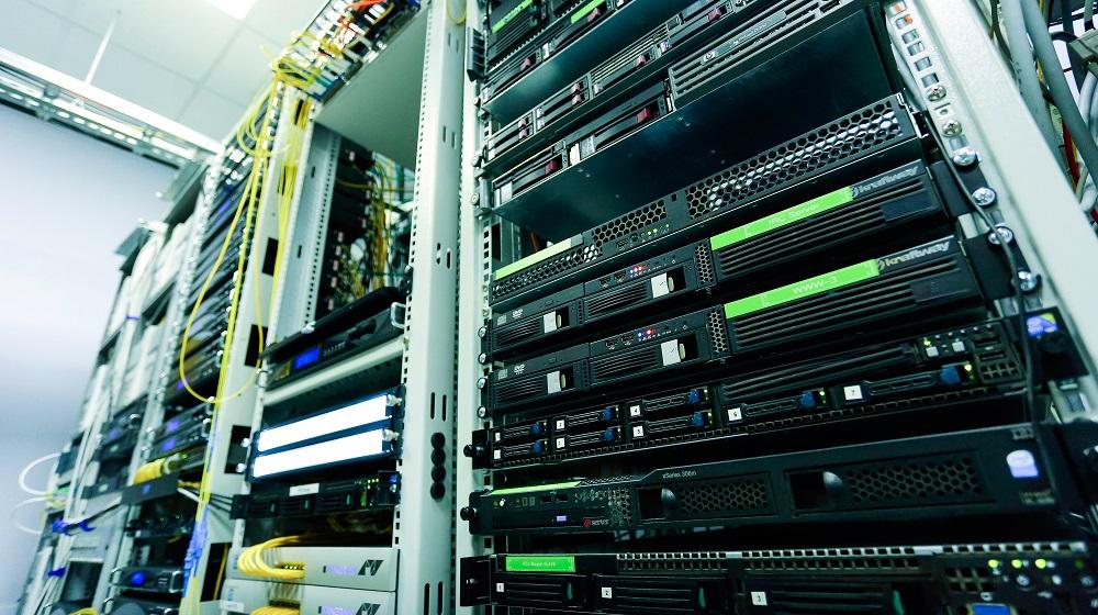 Server racks in a brightly lit room