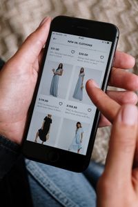 Person viewing online store on their smartphone