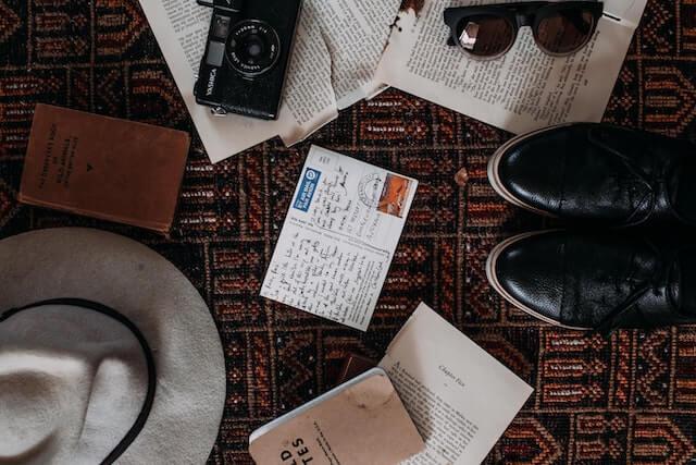 postcard with other travel items