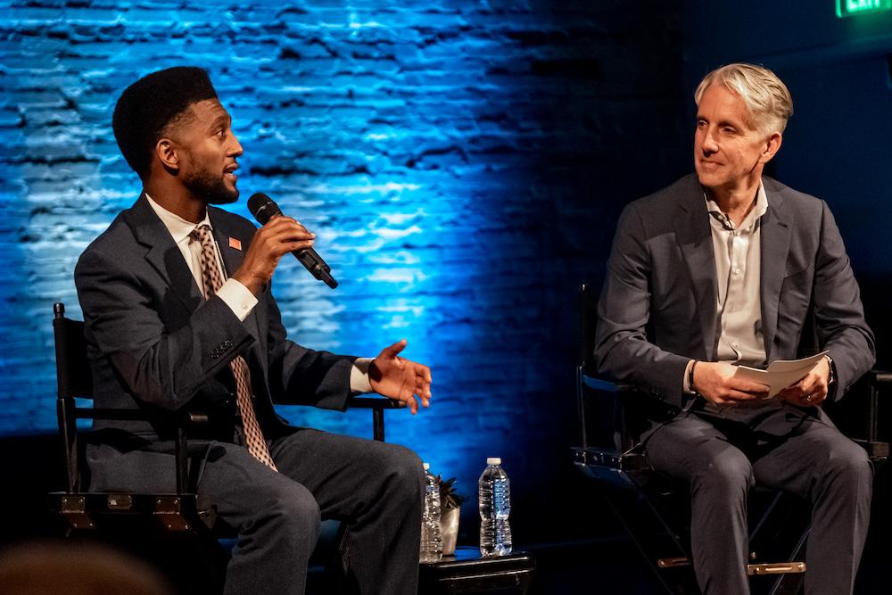 Jeremy Hartman and the mayor of Baltimore on stage at Open Baltimore